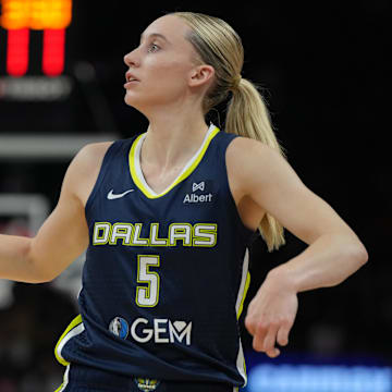 Jul 7, 2025; Phoenix, Arizona, USA; Dallas Wings guard Paige Bueckers (5) shoots against the Phoenix Mercury in the first half at Footprint Center. Mandatory Credit: Rick Scuteri-Imagn Images
