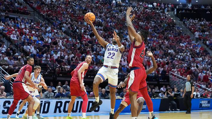 Mar 22, 2026; San Diego, CA, USA; Kansas Jayhawks guard Darryn Peterson (22) shoots against St. John's Red Storm forward Zuby Ejiofor (24) in the second half during a second round game of the men's 2026 NCAA Tournament at Viejas Arena. Mandatory Credit: Kirby Lee-Imagn Images