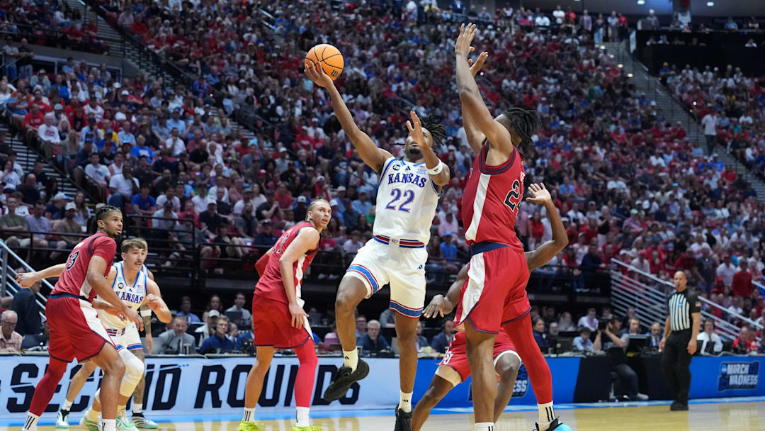 Mar 22, 2026; San Diego, CA, USA; Kansas Jayhawks guard Darryn Peterson (22) shoots against St. John's Red Storm forward Zuby Ejiofor (24) in the second half during a second round game of the men's 2026 NCAA Tournament at Viejas Arena. Mandatory Credit: Kirby Lee-Imagn Images