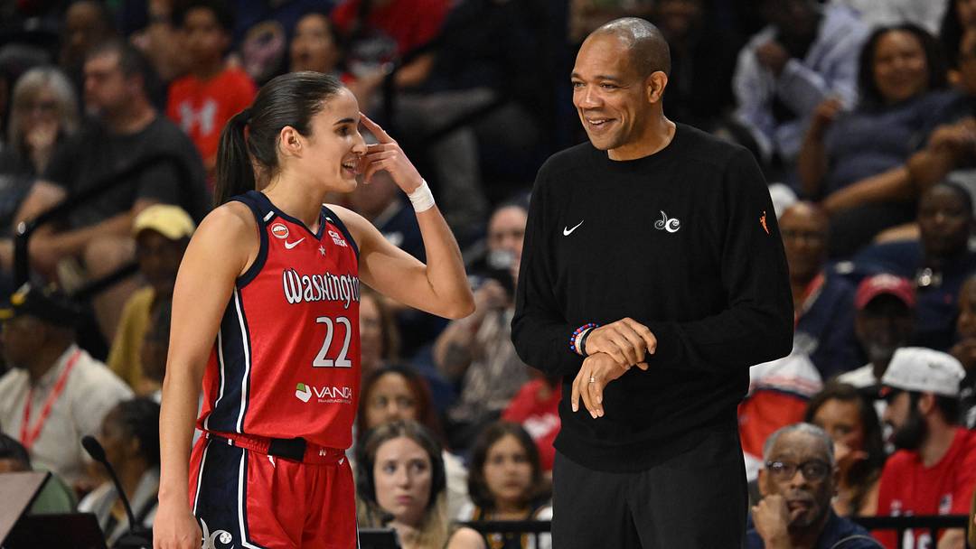 Jun 8, 2026; Washington, District of Columbia, USA; Washington Mystics head coach Sydney Johnson talks with guard Sonia Citron (22) against the Indiana Fever during the first quarter at CareFirst Arena. Mandatory Credit: Rafael Suanes-Imagn Images