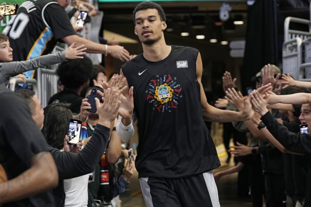 San Antonio Spurs forward Victor Wembanyama (1) enters the court before a game against the Brooklyn Nets. 