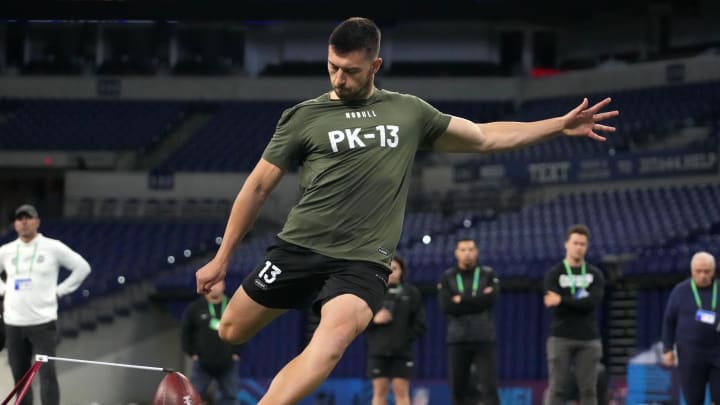 Alex Hale kicks at the Scouting Combine. Hale signed with the Packers in early August.