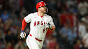 Sep 25, 2025; Anaheim, California, USA; Los Angeles Angels designated hitter Mike Trout (27) watches his home run during the eighth inning against the Kansas City Royals at Angel Stadium. Mandatory Credit: William Liang-Imagn Images