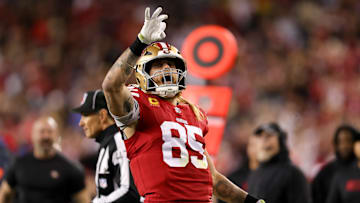 Dec 30, 2024; Santa Clara, California, USA; San Francisco 49ers tight end George Kittle (85) celebrates after a play during the first quarter against the Detroit Lions at Levi's Stadium. Mandatory Credit: Sergio Estrada-Imagn Images