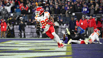 Jan 28, 2024; Baltimore, Maryland, USA; Kansas City Chiefs safety Deon Bush (26) intercepts a pass in the end zone intended for the Baltimore Ravens in the AFC Championship football game at M&T Bank Stadium. Mandatory Credit: Tommy Gilligan-Imagn Images