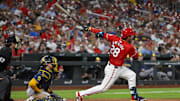 Sep 19, 2025; St. Louis, Missouri, USA;  St. Louis Cardinals third baseman Nolan Arenado (28) hits a three run double against the Milwaukee Brewers during the fifth inning at Busch Stadium. Mandatory Credit: Jeff Curry-Imagn Images
