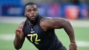 Central Arkansas defensive lineman David Walker participates in drills during the 2025 NFL Combine.