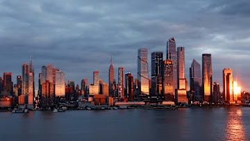 The sun sets on New York City