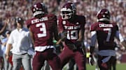Nov 15, 2025; College Station, Texas, USA; Texas A&M Aggies quarterback Marcel Reed (10) celebrates with wide receiver Ashton Bethel-Roman (3) after a touchdown during the third quarter against the South Carolina Gamecocks at Kyle Field. Mandatory Credit: Troy Taormina-Imagn Images