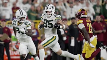 Green Bay Packers tight end Tucker Kraft (85) makes a long reception during the first quarter of their game against the Washington Commanders Thursday, September 11, 2025 at Lambeau Field in Green Bay, Wisconsin.