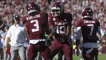 Texas A&M Aggies quarterback Marcel Reed (10) celebrates with wide receiver Ashton Bethel-Roman (3) after a touchdown during the third quarter against the South Carolina Gamecocks at Kyle Field. 