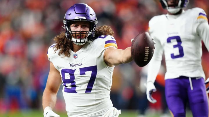 Nov 19, 2023; Denver, Colorado, USA; Minnesota Vikings tight end T.J. Hockenson (87) reacts after making a catch against the Denver Broncos in the first half at Empower Field at Mile High. Mandatory Credit: Ron Chenoy-USA TODAY Sports