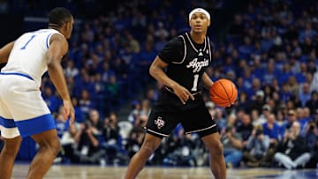 Jan 14, 2025; Lexington, Kentucky, USA; Texas A&M Aggies guard Zhuric Phelps (1) handles the ball during the first half against the Kentucky Wildcats at Rupp Arena at Central Bank Center. Mandatory Credit: Jordan Prather-Imagn Images