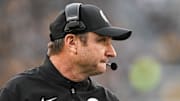 Nov 22, 2025; Iowa City, Iowa, USA; Michigan State Spartans head coach Jonathan Smith looks on during the second quarter against the Iowa Hawkeyes at Kinnick Stadium. Mandatory Credit: Jeffrey Becker-Imagn Images