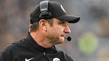 Nov 22, 2025; Iowa City, Iowa, USA; Michigan State Spartans head coach Jonathan Smith looks on during the second quarter against the Iowa Hawkeyes at Kinnick Stadium. Mandatory Credit: Jeffrey Becker-Imagn Images