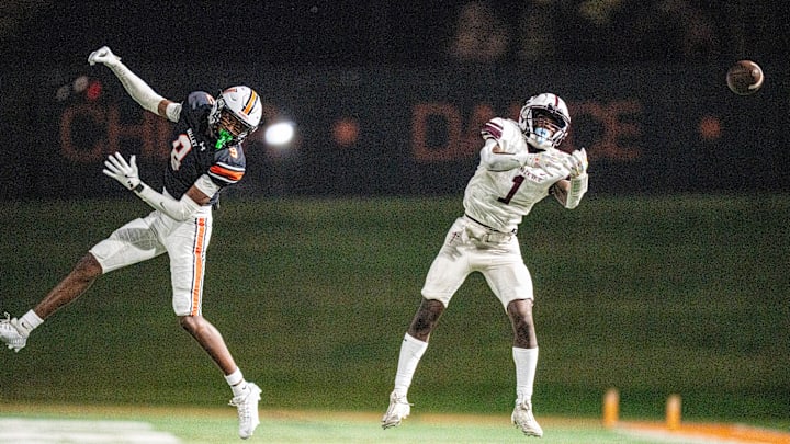 Dowling Catholic wide receiver Sam Drexler (1) watches a pass go by just out of reach during a high school football game between Valley and Dowling Catholic on Aug. 29, 2025, at Valley Stadium in West Des Moines, Iowa. Valley defeated Dowling Catholic 20-19.