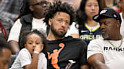 Jun 27, 2025; Dallas, Texas, USA; Detroit Pistons point guard Cade Cunningham watches the game between the Dallas Wings and the Indiana Fever during the second half at the American Airlines Center. Mandatory Credit: Jerome Miron-Imagn Images