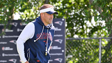 Jul 28, 2025; Foxborough, MA, USA; New England Patriots offensive coordinator Josh McDaniels heads to the practice fields for training camp at Gillette Stadium. Mandatory Credit: Eric Canha-Imagn Images