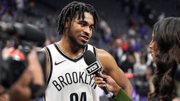 Nov 24, 2024; Sacramento, California, USA; Brooklyn Nets guard Cam Thomas (24) is interviewed after defeating the Sacramento Kings at Golden 1 Center. Mandatory Credit: Darren Yamashita-Imagn Images