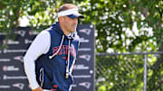 Jul 28, 2025; Foxborough, MA, USA; New England Patriots offensive coordinator Josh McDaniels heads to the practice fields for training camp at Gillette Stadium. Mandatory Credit: Eric Canha-Imagn Images