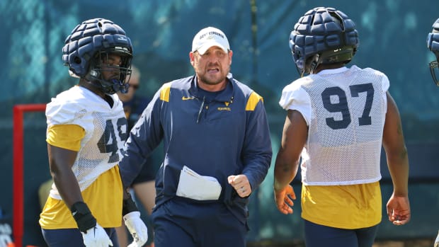 West Virginia University outside linebackers coach Victor Cabral