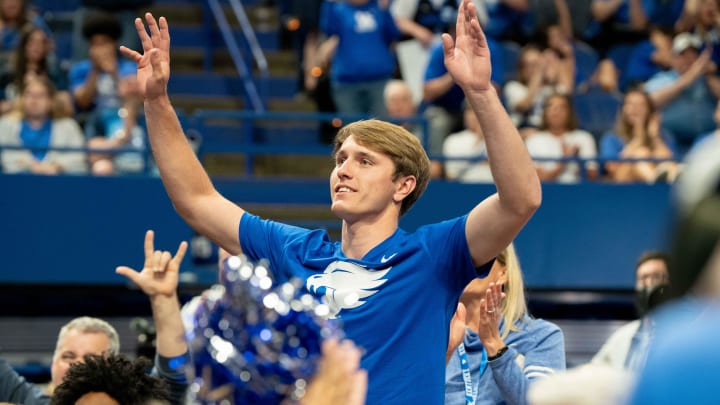 Recruit Travis Perry waves to the crowd during University of Kentucky’s men’s basketball coach Mark Pope’s introductory press conference on Sunday, April 14, 2024.