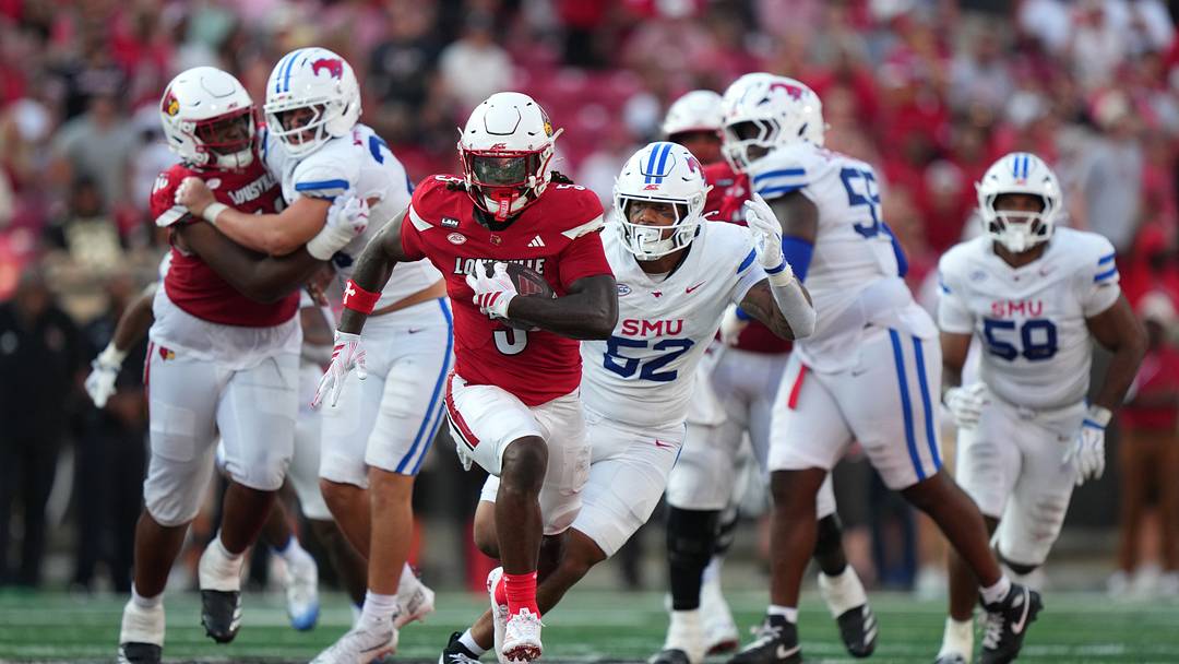 Sep 19, 2026; Louisville, Kentucky, USA;  Louisville Cardinals running back Keyjuan Brown (5) carries the ball against the Southern Methodist Mustangs during the fourth quarter at L&N Federal Credit Union Stadium.  Mandatory Credit: Chris Carter-Imagn Images
