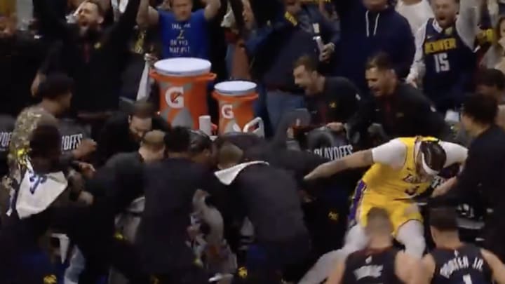Lakers center Anthony Davis fell into the Nuggets celebration after Jamal Murray sank a buzzer-beater to win Game 2 for Denver on Monday night. 