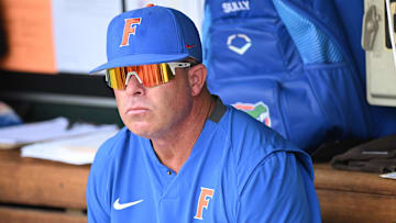 Jun 21, 2023; Omaha, NE, USA;  Florida Gators head coach Kevin O'Sullivan waits for the start of the game against the TCU Horned Frogs at Charles Schwab Field Omaha. Mandatory Credit: Steven Branscombe-Imagn Images