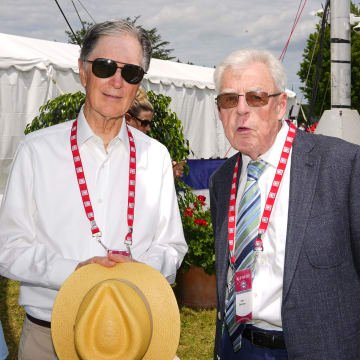 Boston Red Sox majority owner John Henry and ESPN sportswriter Peter Gammons pose for a photo prior to the Baseball Hall of Fame Induction Ceremony at Clark Sports Center in 2022.