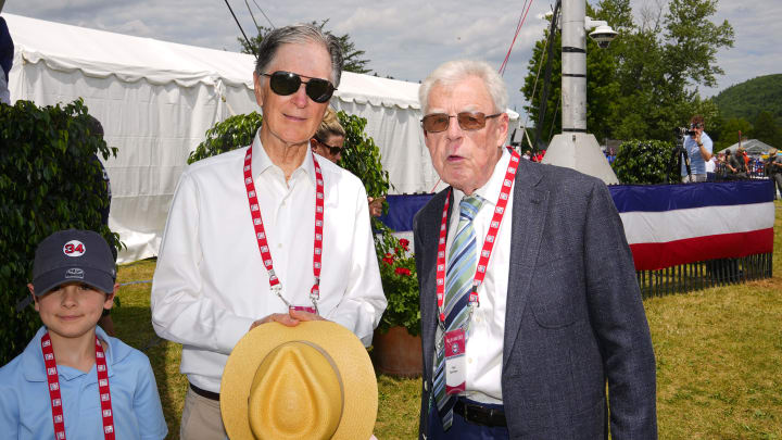 Boston Red Sox majority owner John Henry and ESPN sportswriter Peter Gammons pose for a photo prior to the Baseball Hall of Fame Induction Ceremony at Clark Sports Center in 2022.