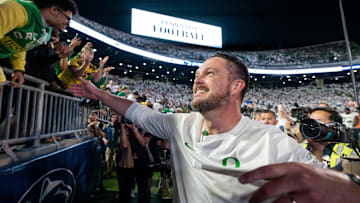 Oregon head coach Dan Lanning celebrates his win with Duck fans as the Oregon Ducks face the Penn State Nittany Lions on Sept. 27, 2025, at Beaver Stadium in University Park, Pennsylvania.