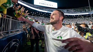 Oregon head coach Dan Lanning celebrates his win with Duck fans as the Oregon Ducks face the Penn State Nittany Lions on Sept. 27, 2025, at Beaver Stadium in University Park, Pennsylvania.