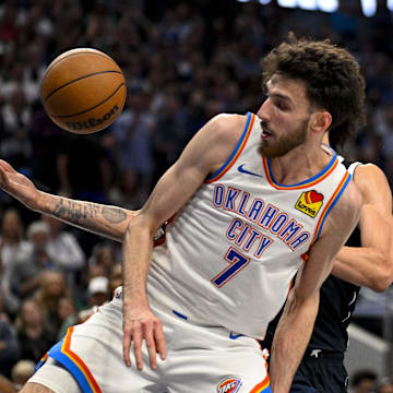 May 13, 2024; Dallas, Texas, USA; Oklahoma City Thunder forward Chet Holmgren (7) looks for the rebound against the Dallas Mavericks during the second half in game four of the second round for the 2024 NBA playoffs at American Airlines Center. Mandatory Credit: Jerome Miron-Imagn Images