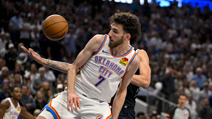 May 13, 2024; Dallas, Texas, USA; Oklahoma City Thunder forward Chet Holmgren (7) looks for the rebound against the Dallas Mavericks during the second half in game four of the second round for the 2024 NBA playoffs at American Airlines Center. Mandatory Credit: Jerome Miron-Imagn Images