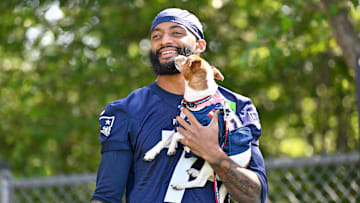 Jul 23, 2025; Foxborough, MA, USA; New England Patriots cornerback Carlton Davis III (7) walks to the practice field for training camp at Gillette Stadium. Mandatory Credit: Eric Canha-Imagn Images