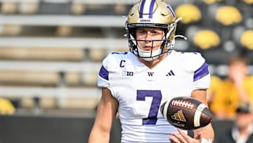 Oct 12, 2024; Iowa City, Iowa, USA; Washington Huskies quarterback Will Rogers (7) warms up before the game against the Iowa Hawkeyes at Kinnick Stadium. Mandatory Credit: Jeffrey Becker-Imagn Images