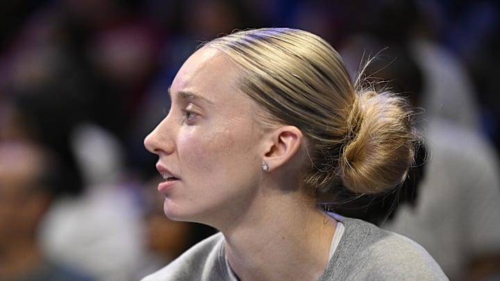 Jun 28, 2025; Arlington, Texas, USA; Dallas Wings guard Paige Bueckers (5) looks on from the team bench during the second half against the Washington Mystics at College Park Center. Mandatory Credit: Jerome Miron-Imagn Images