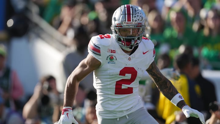Jan 1, 2025; Pasadena, CA, USA; Ohio State Buckeyes wide receiver Emeka Egbuka (2) celebrates after scoring a touchdown against the Oregon Ducks in the first quarter during the 2025 Rose Bowl college football quarterfinal game at Rose Bowl Stadium. Mandatory Credit: Kirby Lee-Imagn Images Jan 1, 2025; Pasadena, CA, USA; Ohio State Buckeyes wide receiver Emeka Egbuka (2) celebrates after scoring a touchdown against the Oregon Ducks in the first quarter during the 2025 Rose Bowl college football quarterfinal game at Rose Bowl Stadium. Mandatory Credit: Kirby Lee-Imagn Images