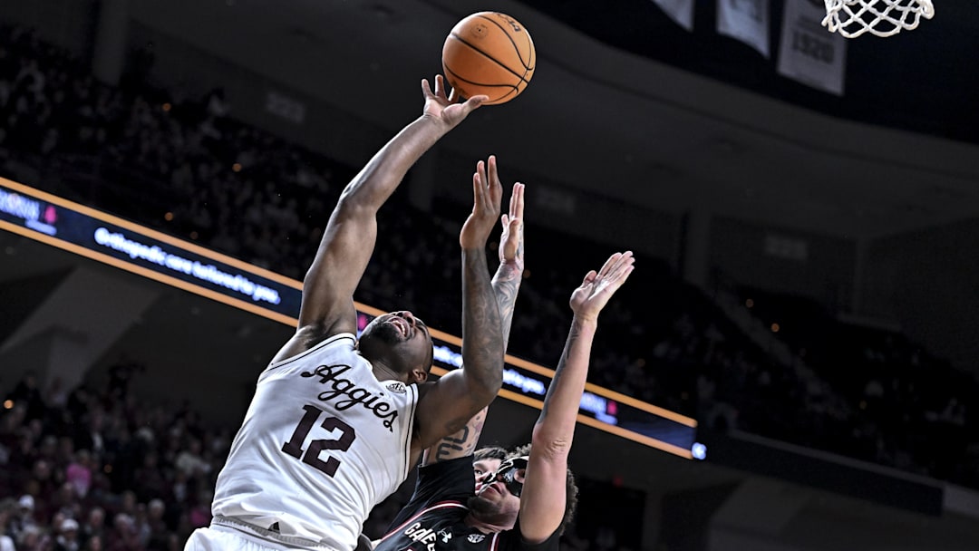 Texas A&M Aggies forward Rashaun Agee (12) shoots the ball as South Carolina Gamecocks guard Myles Stute (10) defends during the second half at Reed Arena.