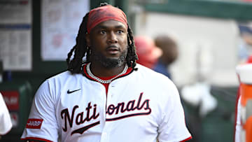 Jul 22, 2025; Washington, District of Columbia, USA; Washington Nationals designated hitter Josh Bell (19) in the dugout after hitting a solo home run against the Cincinnati Reds during the fourth inning at Nationals Park. Mandatory Credit: Brad Mills-Imagn Images