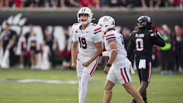 Nov 15, 2025; Cincinnati, Ohio, USA;  Arizona Wildcats kicker Michael Salgado-Medina (19) reacts after kicking a field goal against the Cincinnati Bearcats in the second half at Nippert Stadium. Mandatory Credit: Aaron Doster-Imagn Images
