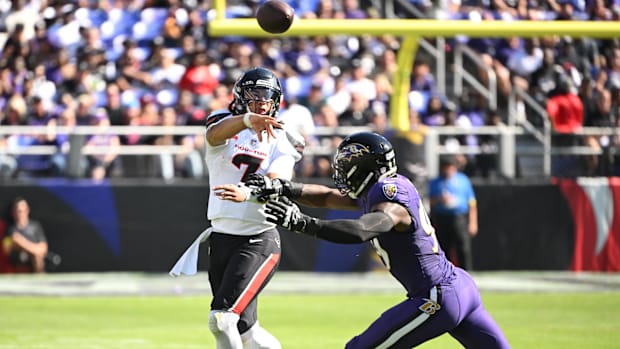 Oct 5, 2025; Baltimore, Maryland, USA; Houston Texans quarterback C.J. Stroud (7) throws past Baltimore Ravens linebacker Oda