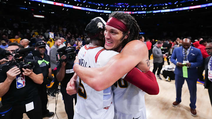 Denver Nuggets forward Aaron Gordon (50) and guard Kentavious Caldwell-Pope (5) celebrate winning against the Los Angeles Lakers in the 2023 Western Conference Finals.