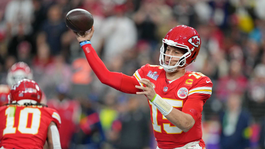 Feb 11, 2024; Paradise, Nevada, USA; Kansas City Chiefs quarterback Patrick Mahomes (15) passes the ball against the San Francisco 49ers during the first quarter Super Bowl LVIII at Allegiant Stadium. Mandatory Credit: Kirby Lee-USA TODAY Sports