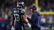 Oct 20, 2025; Seattle, Washington, USA; Seattle Seahawks linebacker Ernest Jones IV (13) talks with Seattle Seahawks head coach Mike Macdonald during the fourth quarter against the Houston Texans at Lumen Field. Mandatory Credit: Steven Bisig-Imagn Images