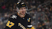 Mar 11, 2025; Pittsburgh, Pennsylvania, USA;  Pittsburgh Penguins center Sidney Crosby (87) smiles on the ice against the Vegas Golden Knights during the third period at PPG Paints Arena. Mandatory Credit: Charles LeClaire-Imagn Images