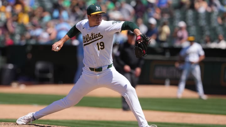 Jun 9, 2024; Oakland, California, USA; Oakland Athletics relief pitcher Mason Miller (19) throws a pitch against the Toronto Blue Jays during the ninth inning at Oakland-Alameda County Coliseum.
