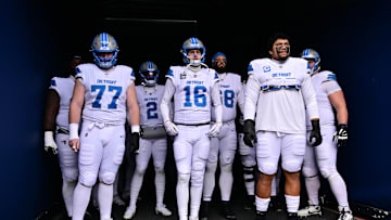Dec 22, 2024; Chicago, Illinois, USA; Detroit Lions center Frank Ragnow (77), quarterback Jared Goff (16), and offensive tackle Penei Sewell (58) stand in the tunnel before the game against the Chicago Bears at Soldier Field. Mandatory Credit: Daniel Bartel-Imagn Images