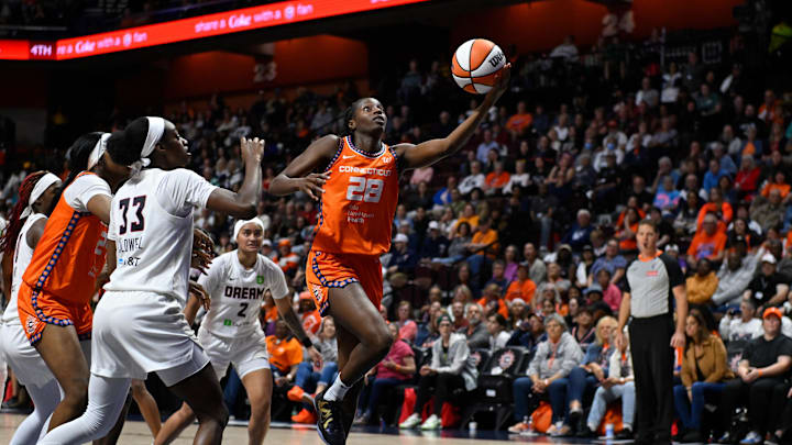 Sep 10, 2025; Uncasville, Connecticut, USA; Connecticut Sun guard Mamignan Toure (28) shoots a layup against the Atlanta Dream during the second half at Mohegan Sun Arena. 